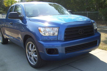 The owner of this Tundra modified the stock Tundra grill so it would fit with the Sequoia bumper.
