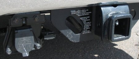 The stock class IV receiver hitch on a new Toyota Tundra.