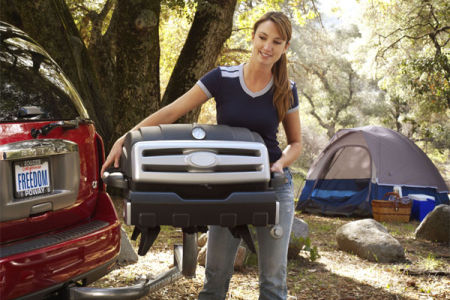 This person seems a little too happy to be real, but it's a good photo of the grill.