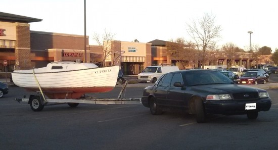 Crown Vic towing a boat